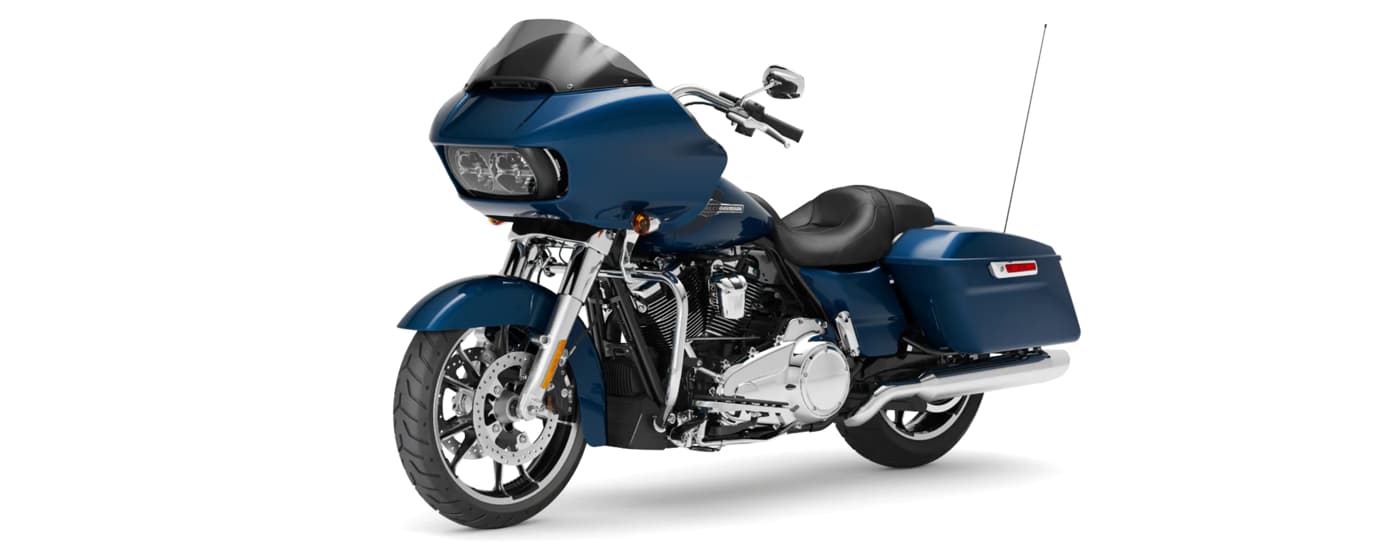 A blue 2022 Harley-Davidson Road Glide is angled left.