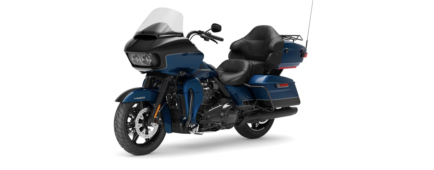 A blue 2022 Harley-Davidson Road Glide Limited is angled left.