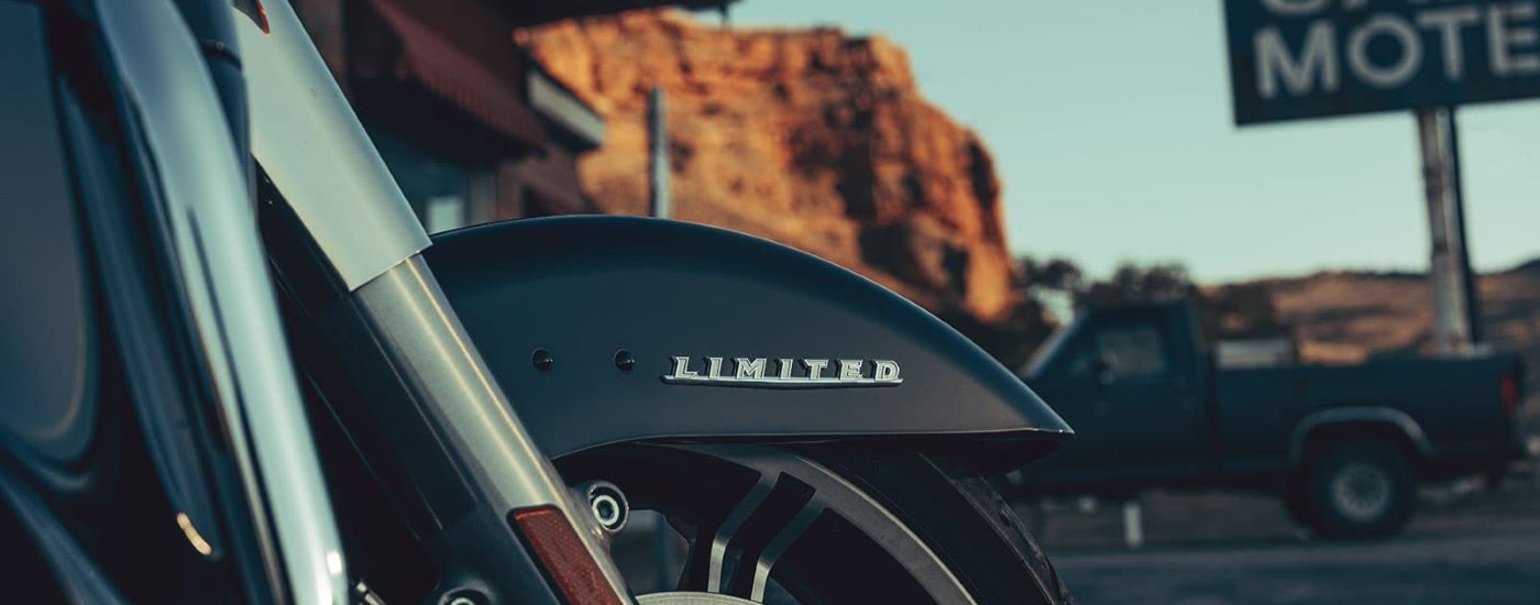 A close up shows the Limited badge on a black 2022 Harley-Davidson Ultra Limited.