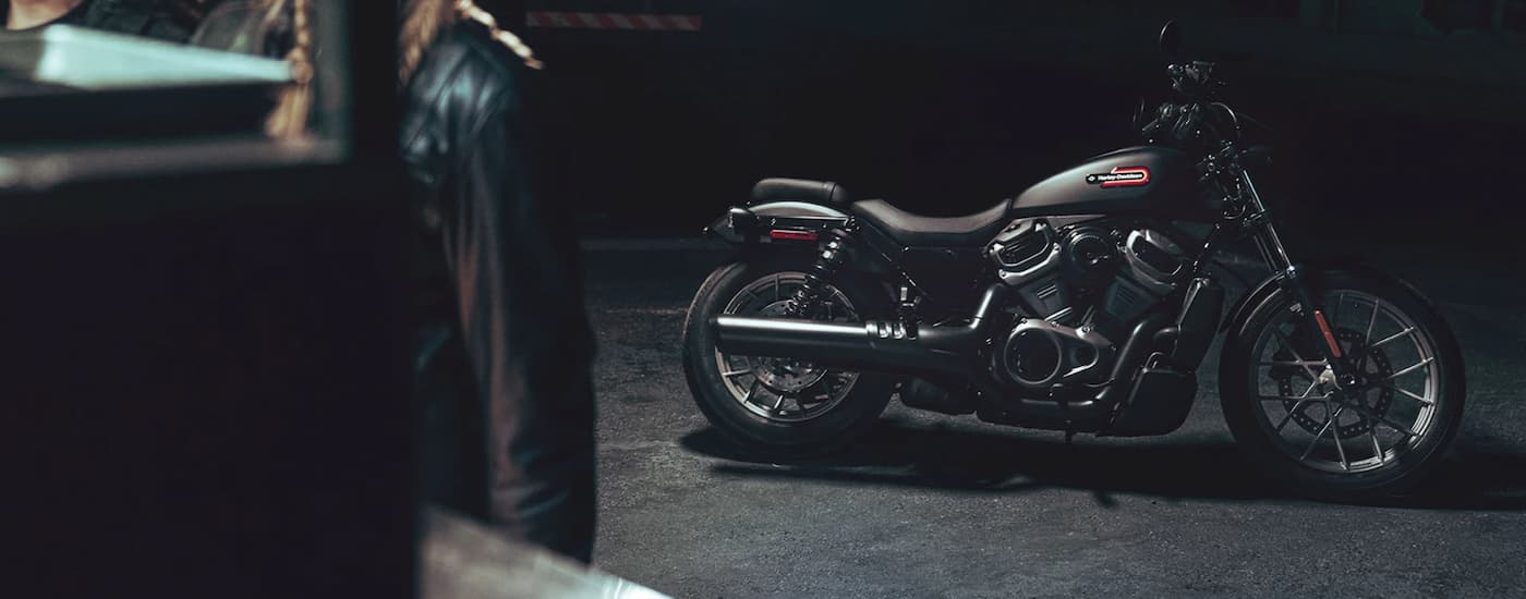 A grey 2023 Harley-Davidson Nightster Special is shown from the side parked at night.