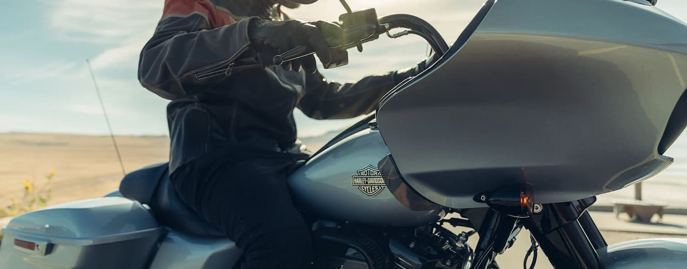 A close up of the side of a grey 2023 Harley-Davidson Road Glide Special is shown.