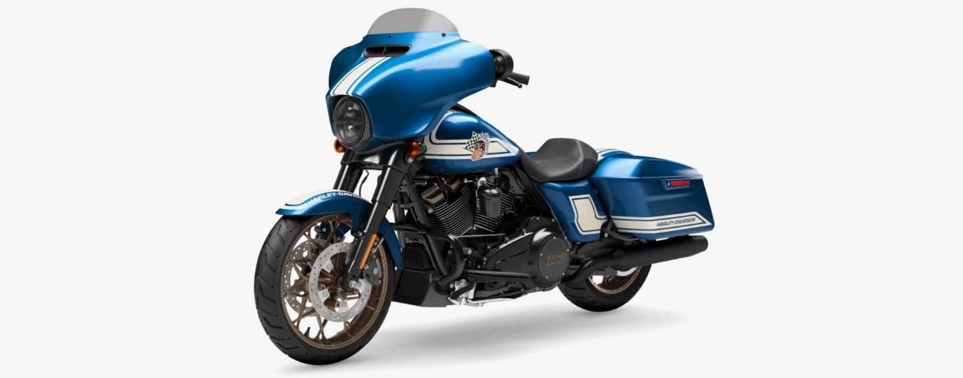 A blue 2023 Street Glide ST is shown angled left.